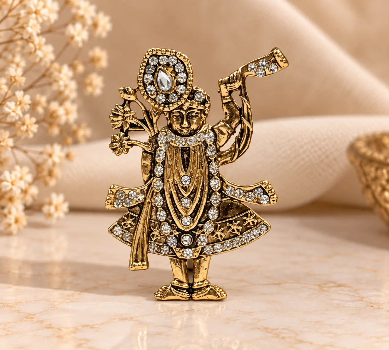 Gold-Tone Traditional Figurine Brooch with Clear Stones