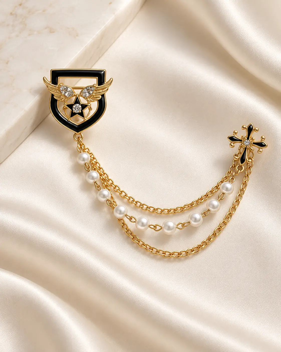 Black & Gold Shield Brooch with Pearl Chain Drapes