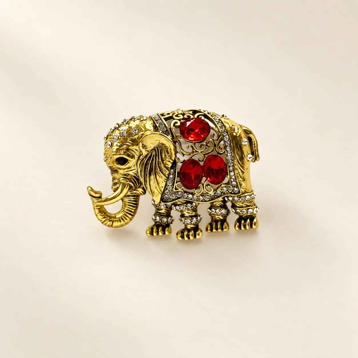Gold-Tone Elephant Brooch with Red Stone Accents