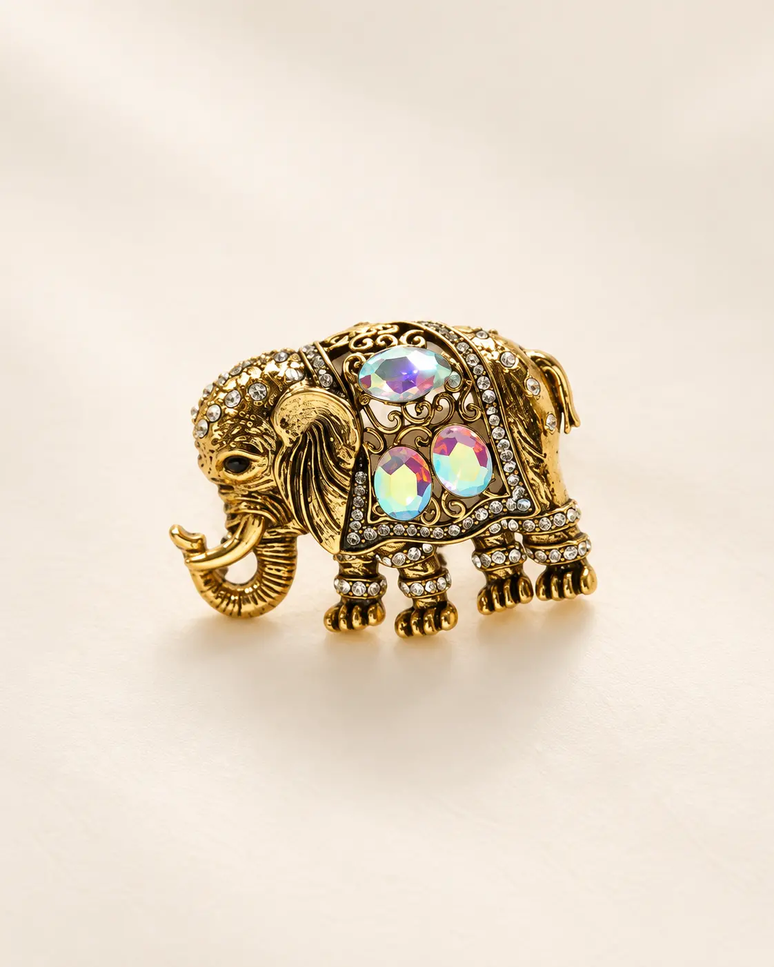 Gold-Tone Elephant Brooch with Iridescent Stone Accents