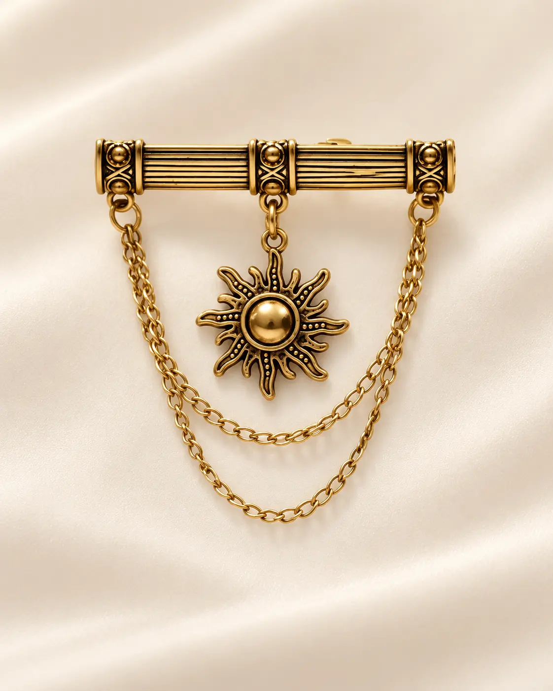 Gold-Tone Sunburst Brooch with Double Chain Drapes